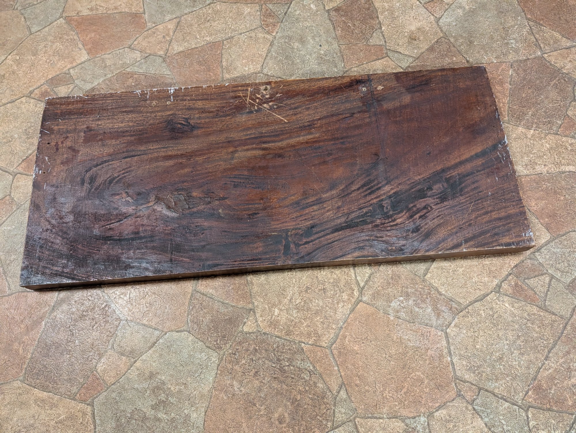 Back angle view showing wood grain pattern and construction evidence
