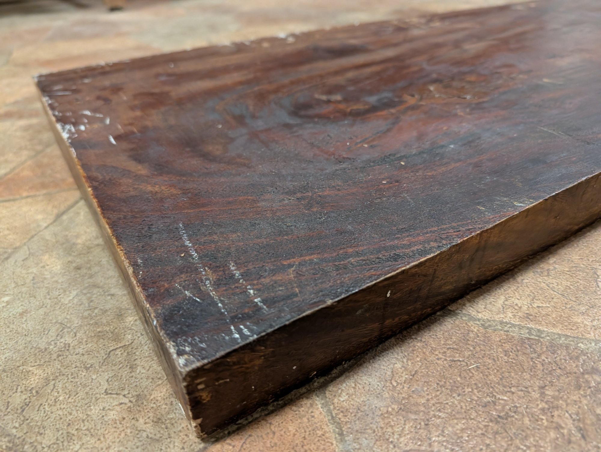 Back corner close-up showing chisel marks and the mysterious hole where it was hung